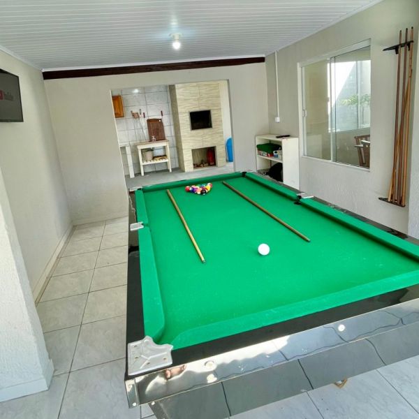 CASA COM O PTIO PRIVATIVO EM BOMBAS COM PISCINA